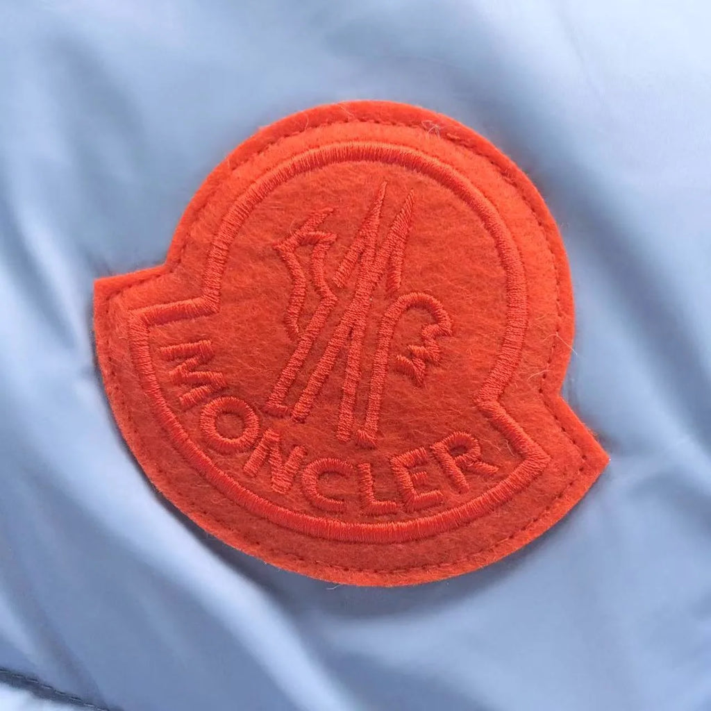 Moncler Light Blue Hooded Puffer Jacket with Orange Logo